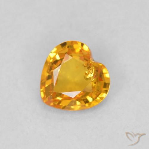 34. 0.40ct Orange Sapphire Heart VS